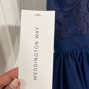Beautiful Navy dress with light straps. Preferably use with strapless.